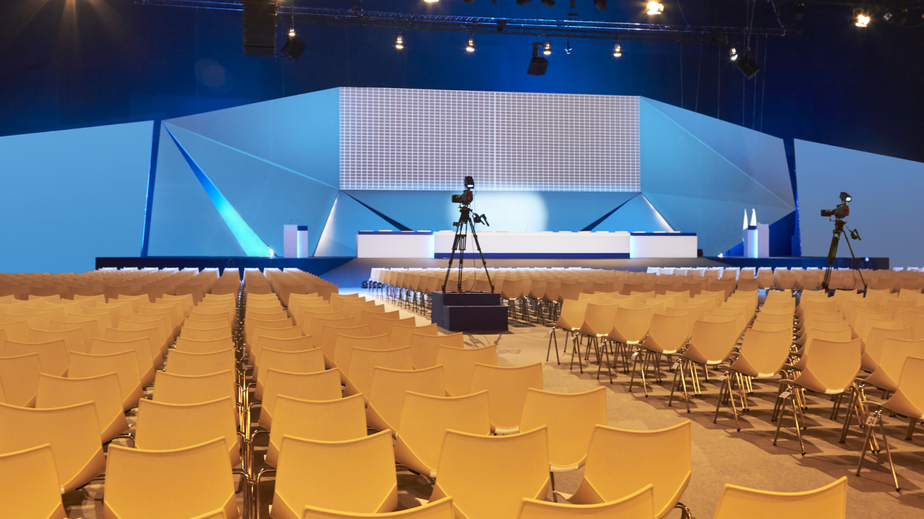 Conference hall. Convention center with podium. Professional meeting. Auditorium